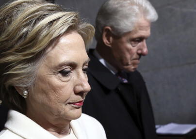 Former Sen. Hillary Clinton and former President Bill Clinton arrive on the West Front of the U.S. Capitol on Friday, Jan. 20, 2017, in Washington, for the inauguration ceremony of Donald J. Trump as the 45th president of the United States. (Win McNamee/Pool Photo via AP)